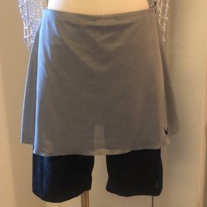 Nike metallic color silver grey tennis skirt with long built in black shorts